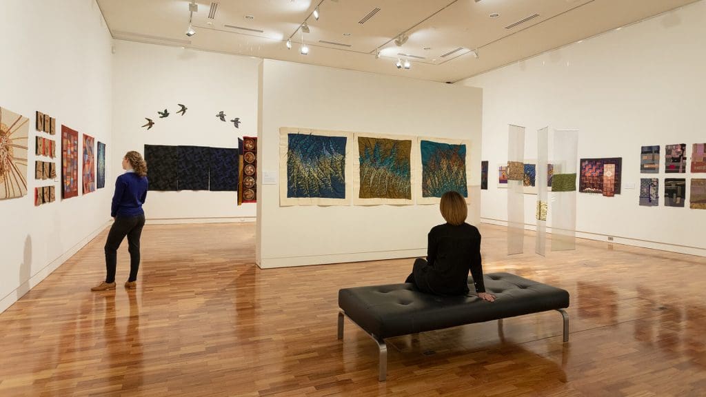 two people looking at artwork at Tamworth Regional Gallery