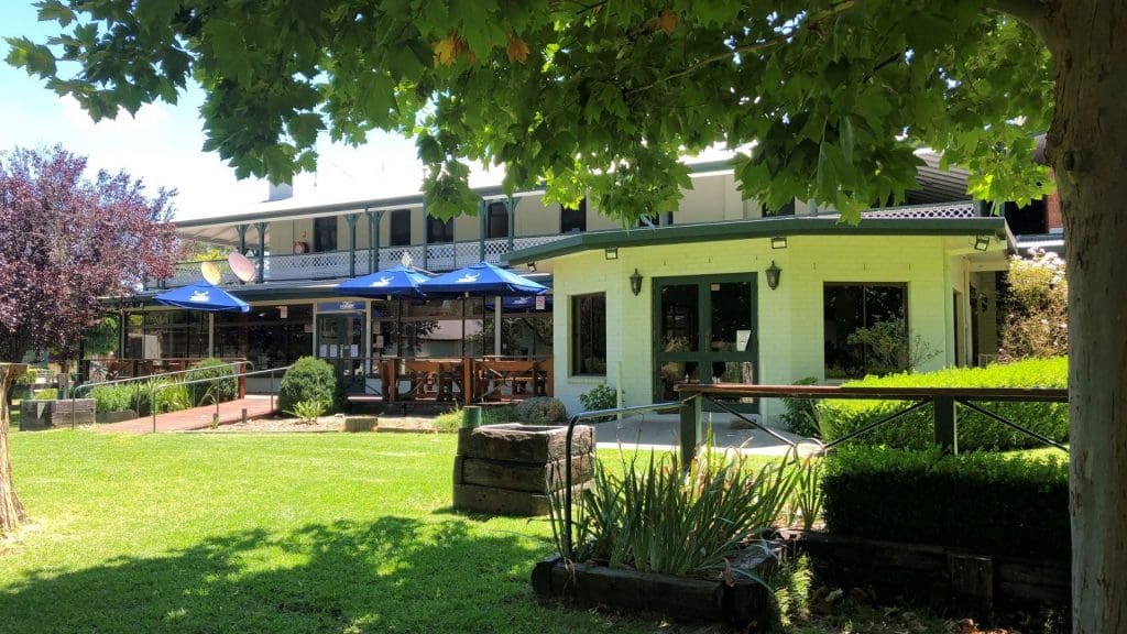 The beer garden and green grass at the back of Bendemeer Hotel grass at the back